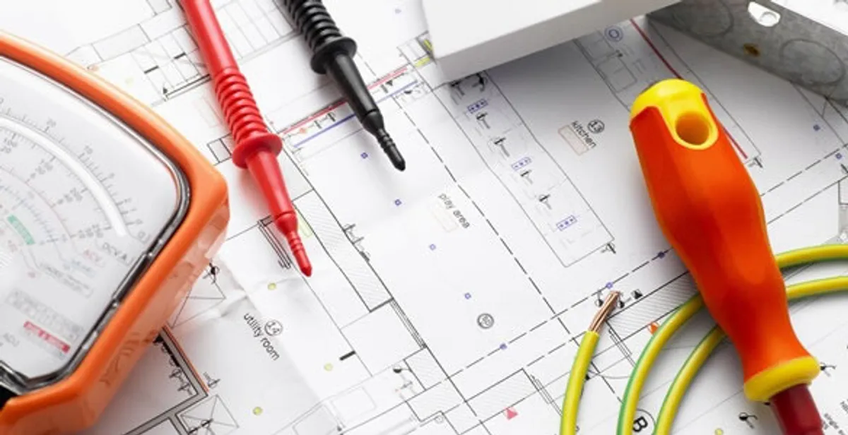 licensed electrician planning and testing electrical systems using professional tools in Baton Rouge, LA